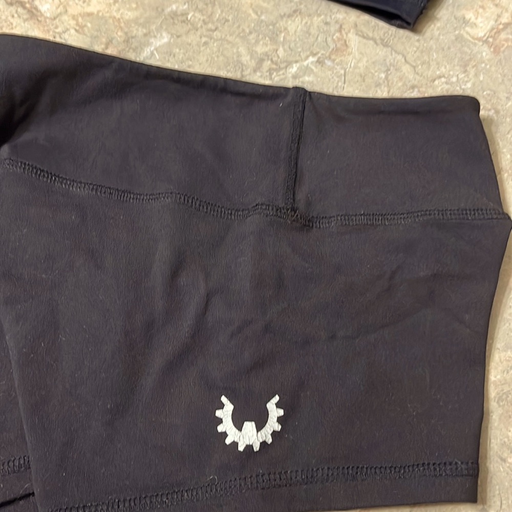 Wod Gear wide band black spandex shorts.